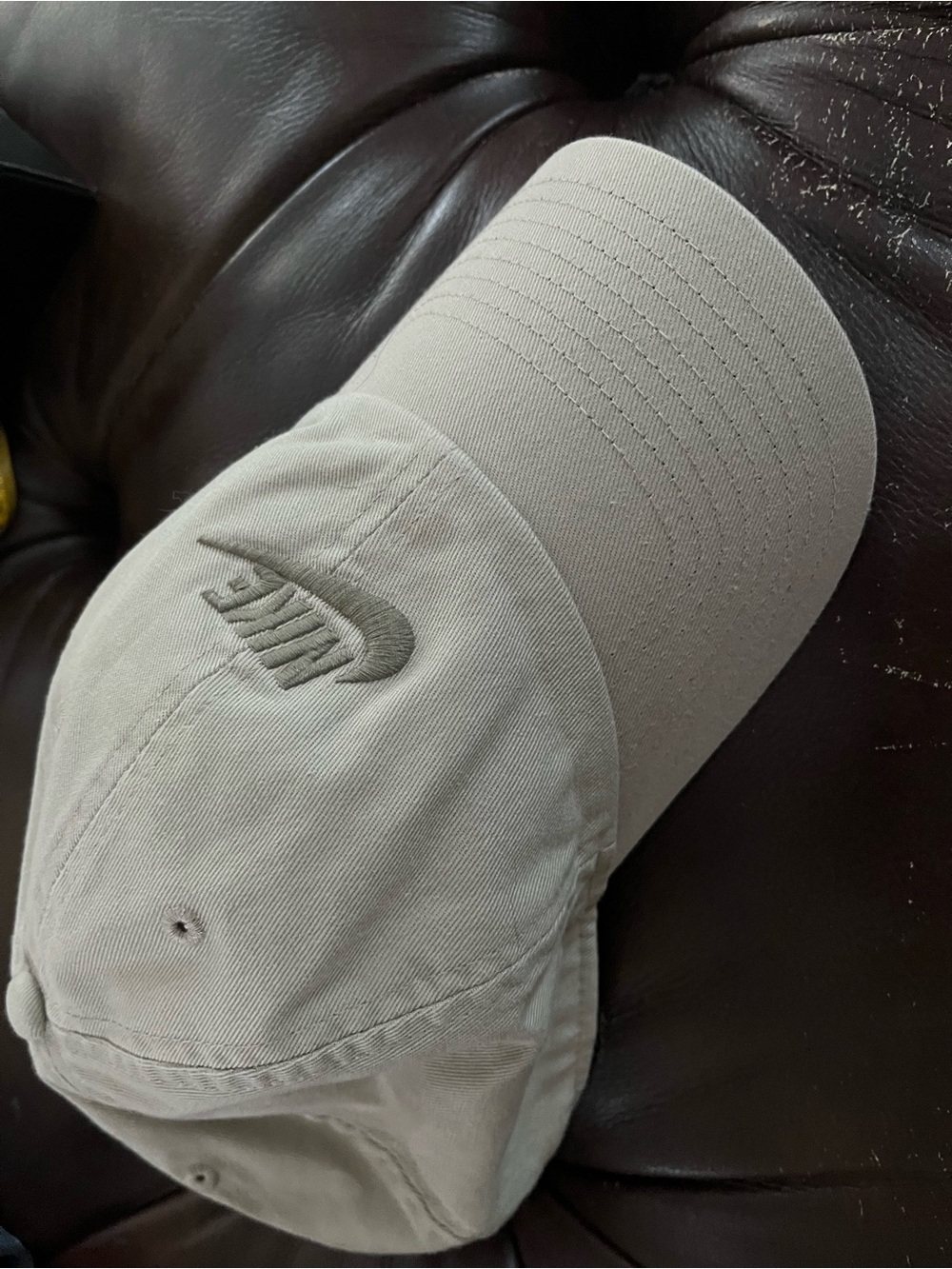 Cream Nike Club Unstructured Futura washed cap with Nike swoosh.